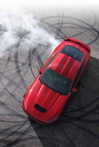 Overhead view of a 2024 Ford Mustang® model with tire tracks on pavement | Ricart Ford in Groveport OH