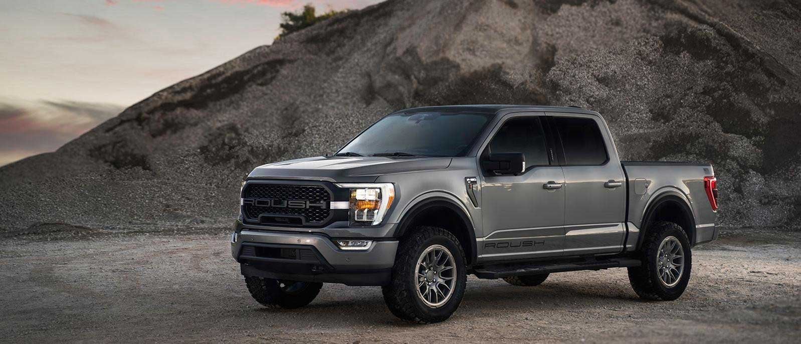 Roush F 150 exterior side view with dirt mountain in background