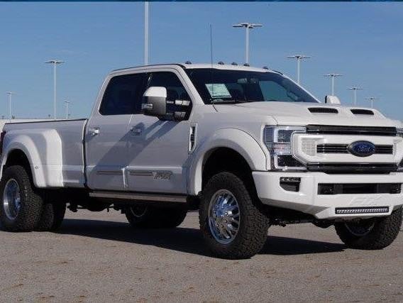 Front view of a 2020 Ford F-350 Crew Cab DRW pickup truck, highlighting its robust design and large wheels.