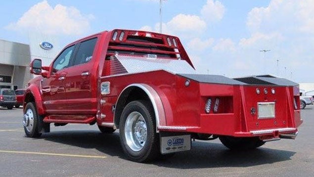 2020 Ford F-450 Crew Cab DRW 4x4 pickup truck, highlighting its exterior design and features from a different angle.