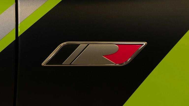 Roush Ridge logo black and red on black strip and bright green paint