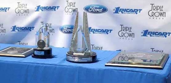 Triple Crown Award on table